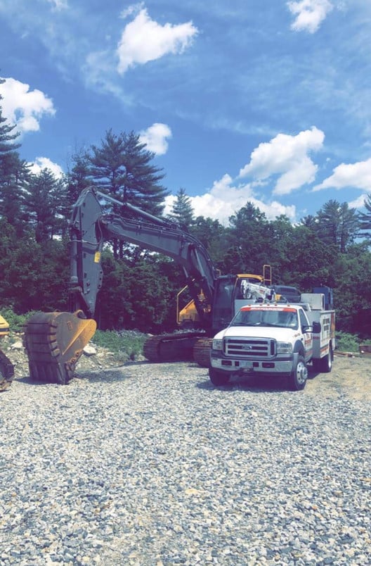 excavator and truck